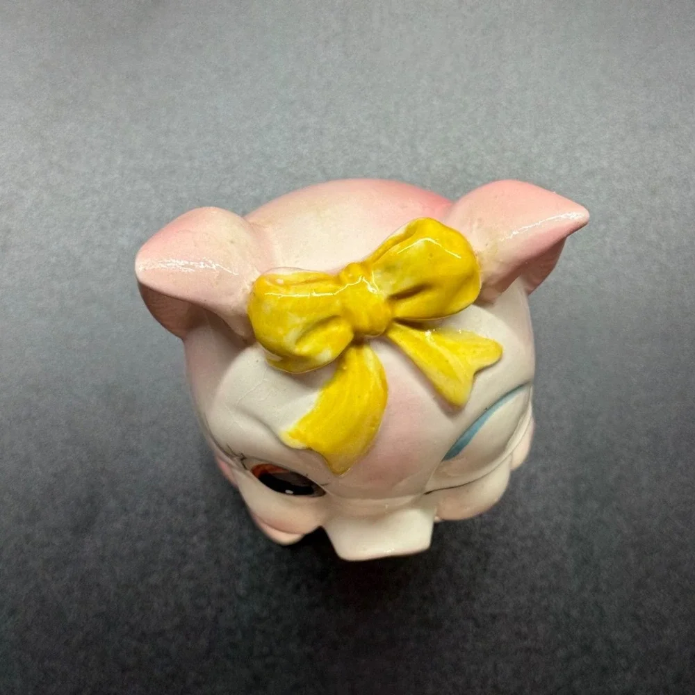 Vintage Japanese Ceramic Piggy Bank with Winking Expression And a Yellow Bow - Picture 7 of 11
